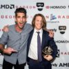 A bold step and repeat for the Proto Awards