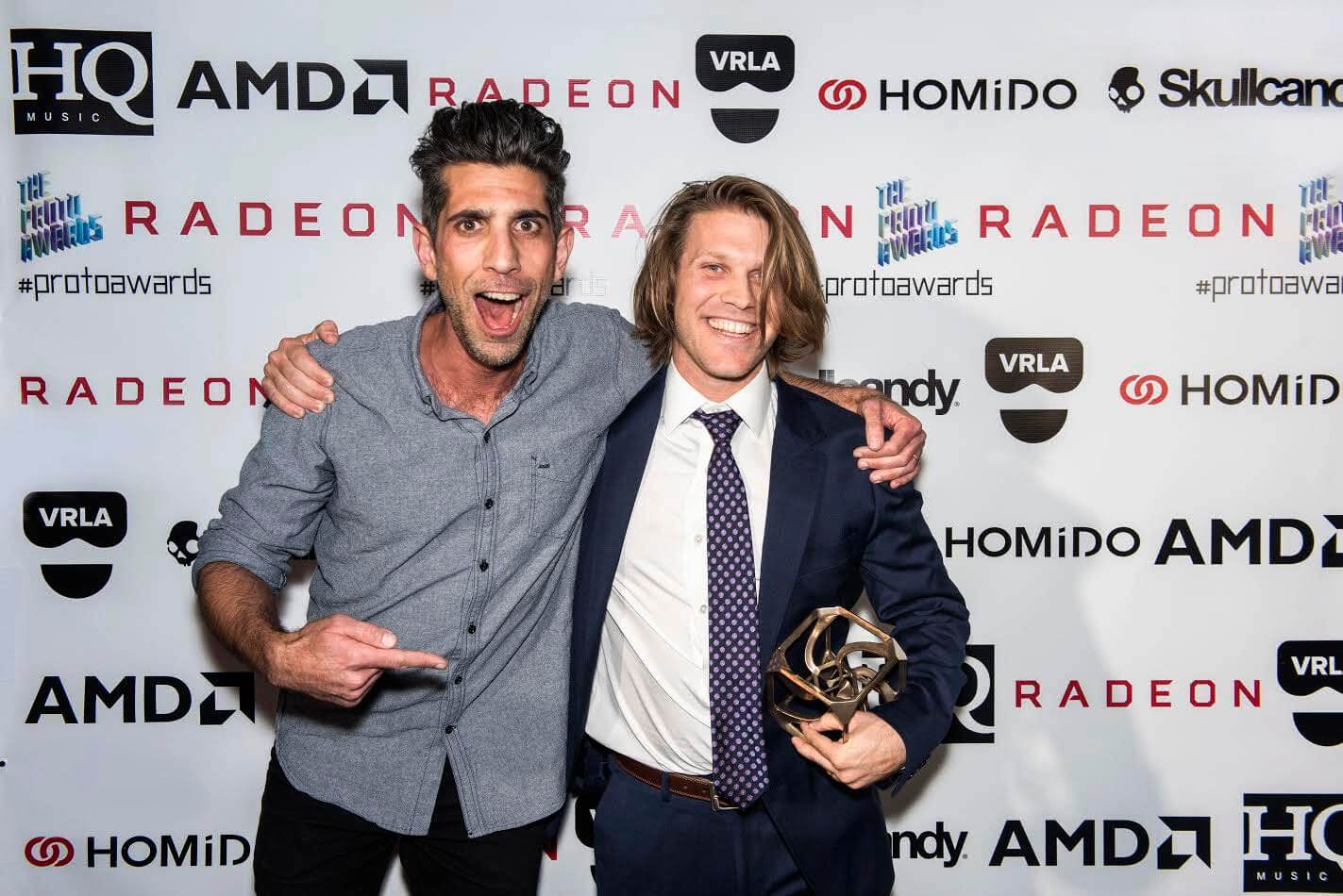A bold step and repeat for the Proto Awards