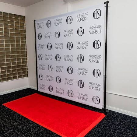 8 by 8 foot step and repeat backdrop for The House on Sunset