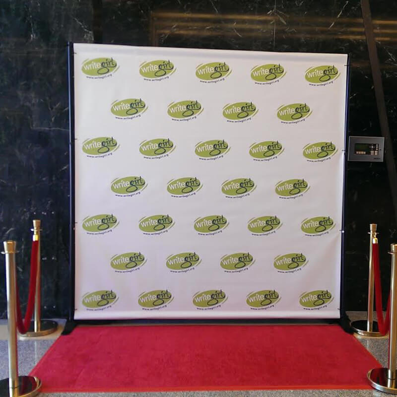 A custom 8 by 8 foot step and repeat for WriteGirl