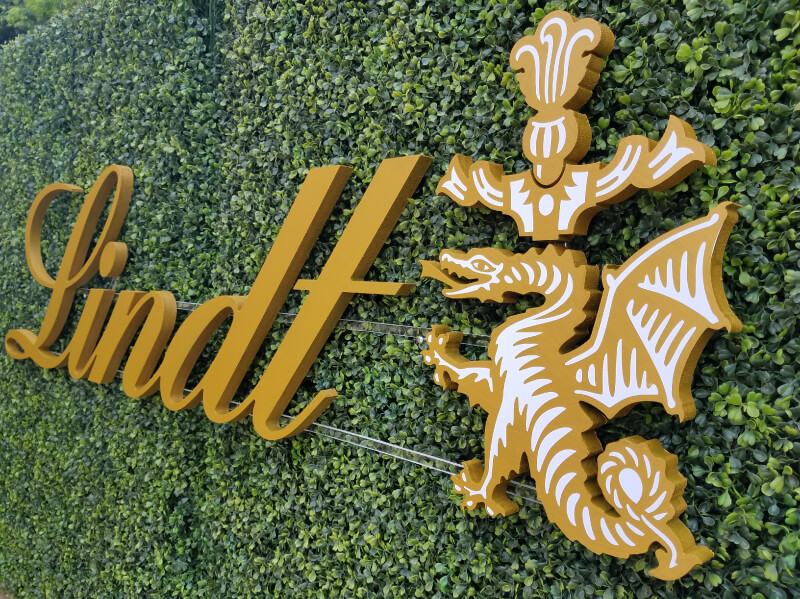 A Hedge Wall with a custom cutout logo