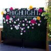 8 by 8 foot Hedge Wall with custom cutout lettering and flowers